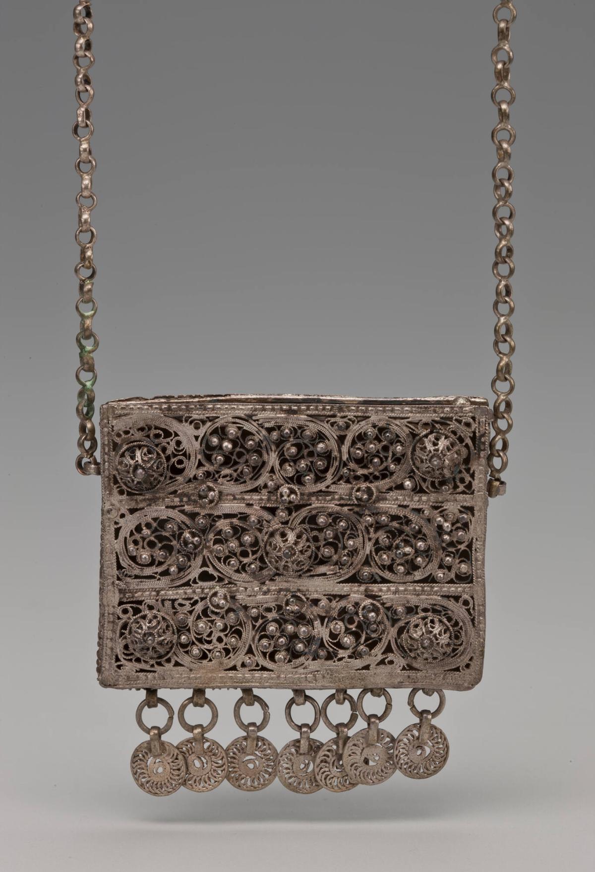 Filigree Case on Long Chain to Wear Round Neck; Hammered Design on the Reverse