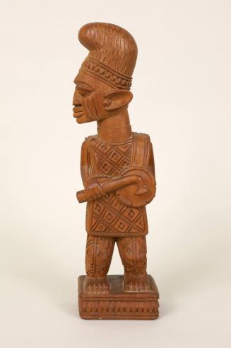 Shaman Playing Talking Drum